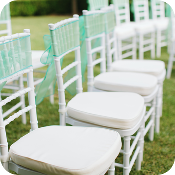 white tiffany chair hire by event marquees | © Event Marquees