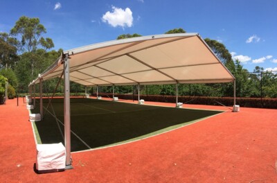 marquee on a tennis court by event marquees