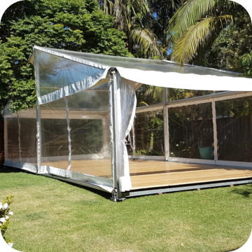 clear marquee with wooden floor hire by event marquees | © event marquees