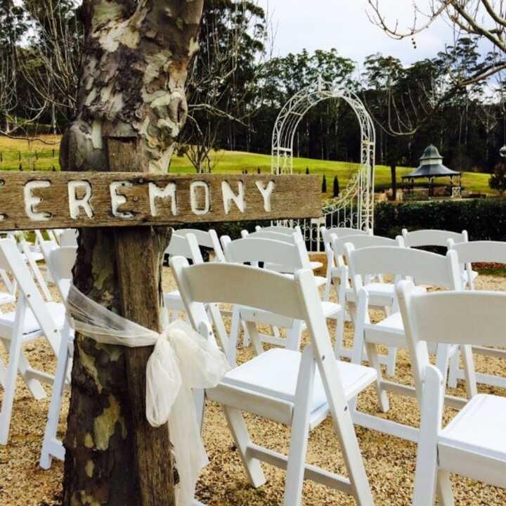 white folding chairs by event marquees | © event marquees