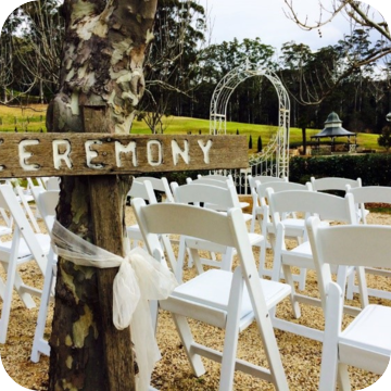 white folding chairs by event marquees | © event marquees