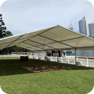 Marquee and beer table set hire by Event Marquees | © Event Marquees