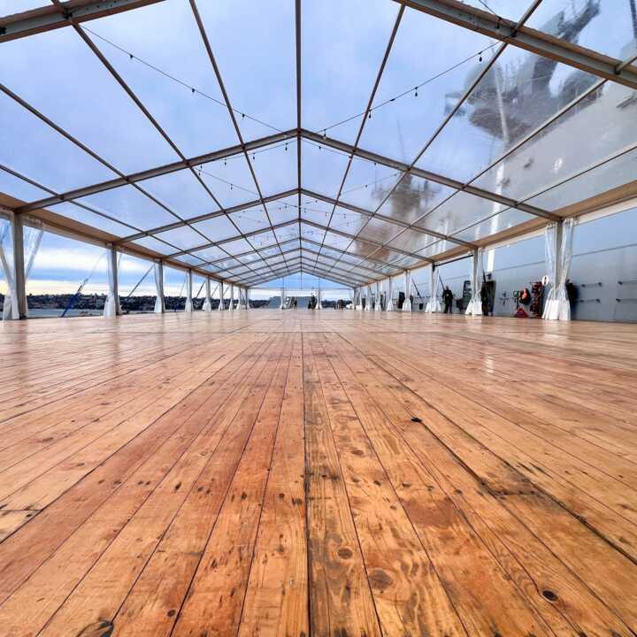 Clear Marquee and Wooden Floor Hire by Event Marquees | © Event Marquees